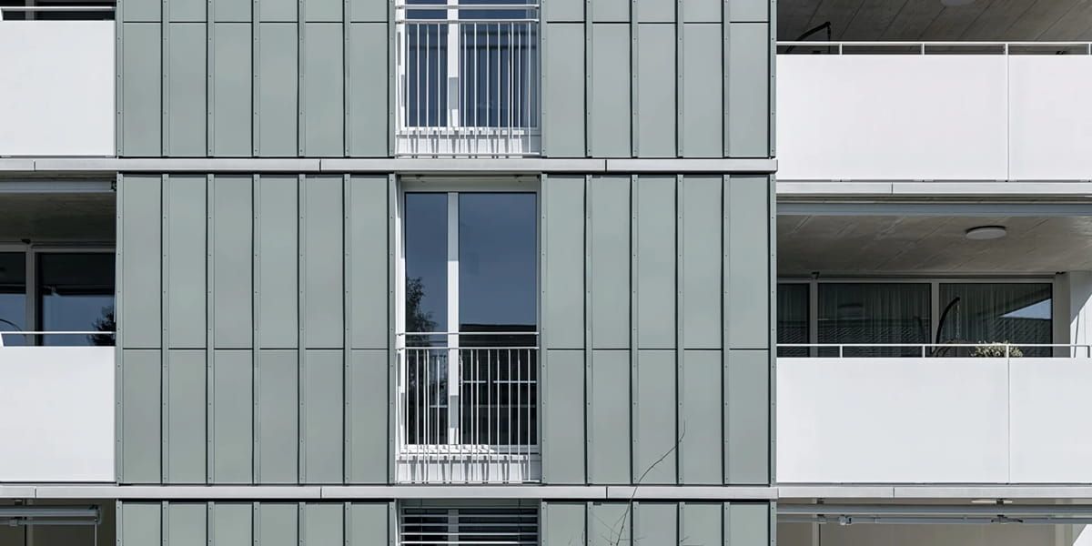 Exterior view of CO2 Neutral Residential balconies incorporating Crystalline Silicon Photovoltaic Technology Glass by Onyx Solar