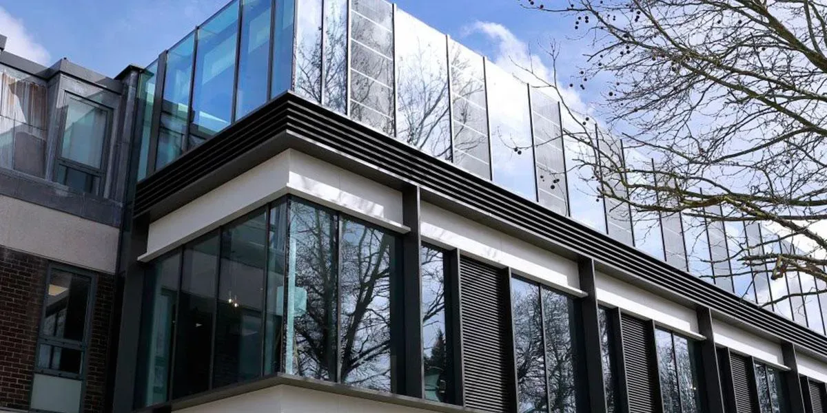 Outside view Bidwells House curtain wall incorporating Amorphous Silicon Photovoltaic Technology Glass by Onyx Solar