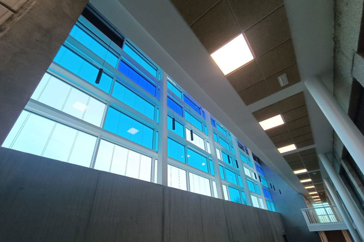 Interior view of UCAV Labs façade featuring Crystalline and Amorphous Silicon Photovoltaic Technology Glass by Onyx Solar