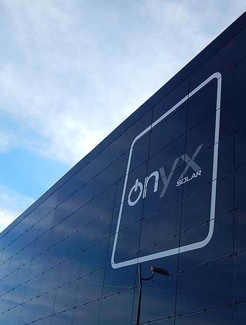 Onyx Solar headquarter façade featuring amorphous silicon photovoltaic technology by Onyx Solar