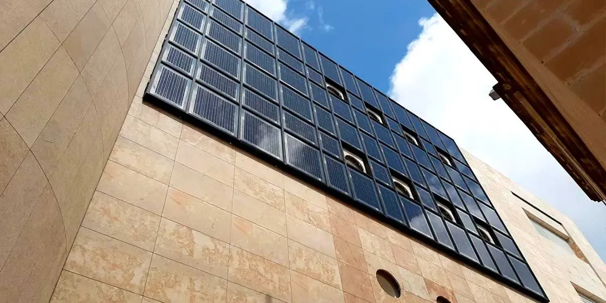 Exterior view of Floriana Project House façade incorporating Crytsalline Silicon Photovoltaic Technology Glass by Onyx Solar