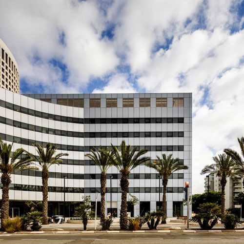 Image of a building façade integrated with photovoltaic glass panels