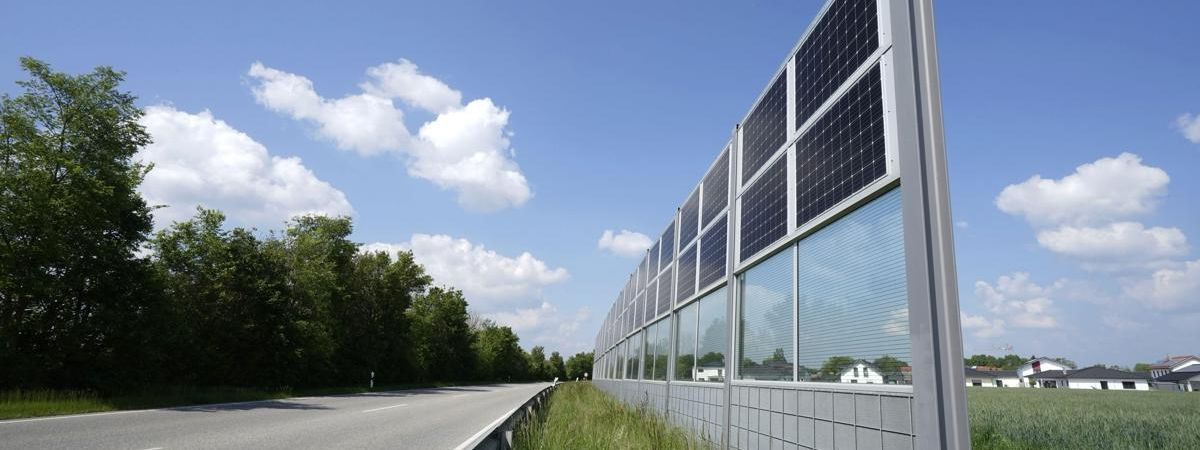 Acoustic Barrier of Photovoltaic Glass by Onyx Solar along of a highway