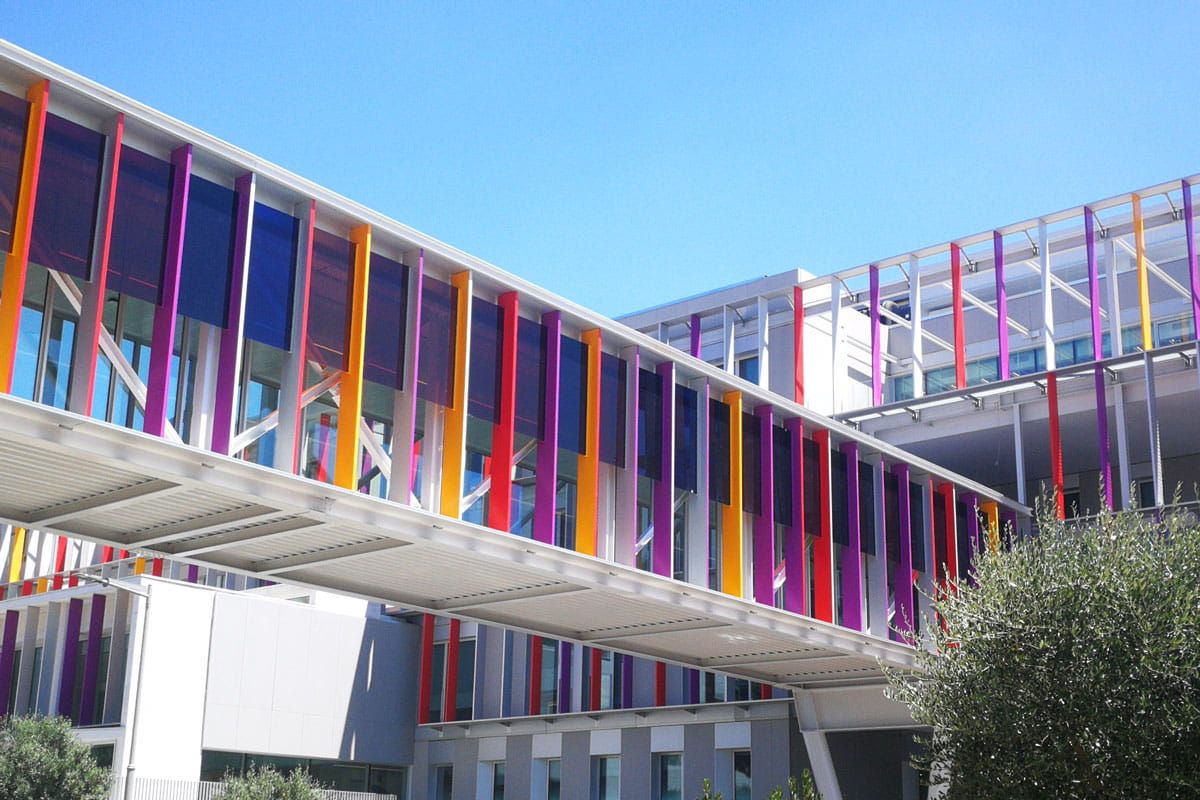 Outside view of SJD Pediatric Cancer Center brise soleil incorporating Amorphous Silicon Photovoltaic Technology Glass by Onyx Solar