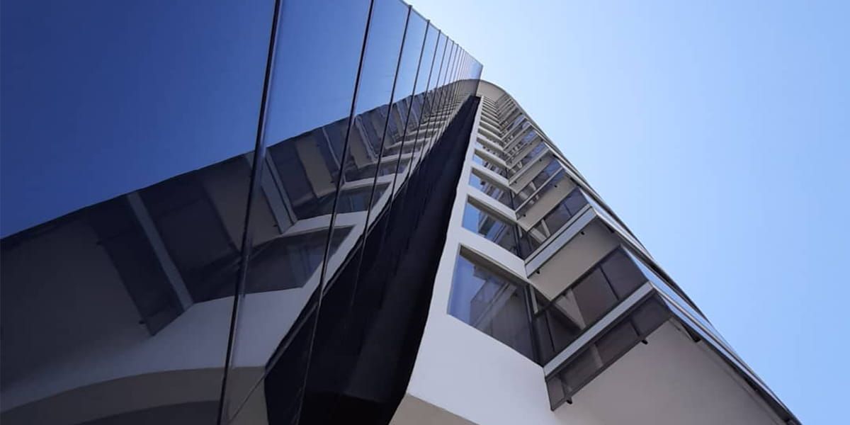 Outside details of Elipse Tower façade incorporating Amorphous Silicon Photovoltaic Technology Glass by Onyx Solar