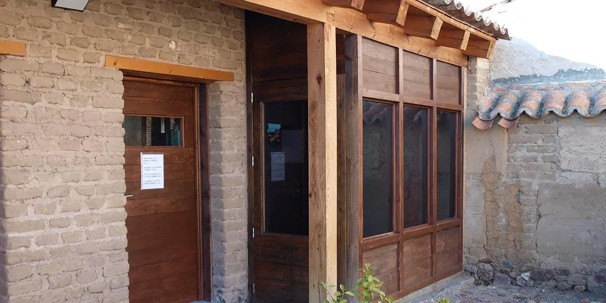 Exterior view of Pilgrim´s Hostel windows and door featuring Amorphous Silicon Photovoltaic Technology by Onyx Solar