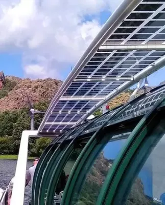 Side view of Boat on the Lake of Sanabria canopy incorporating Crystalline Silicon Photovoltaic Technology Glass by Onyx Solar