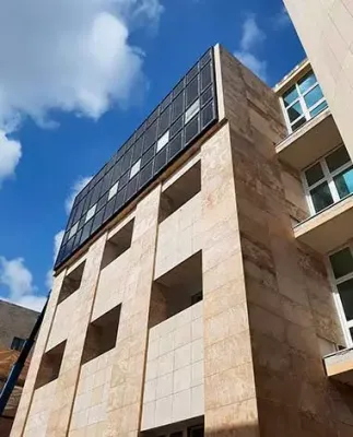 Side view of Floriana Project House façade incorporating Crystalline Silicon Photovoltaic Technology Glass by Onyx Solar