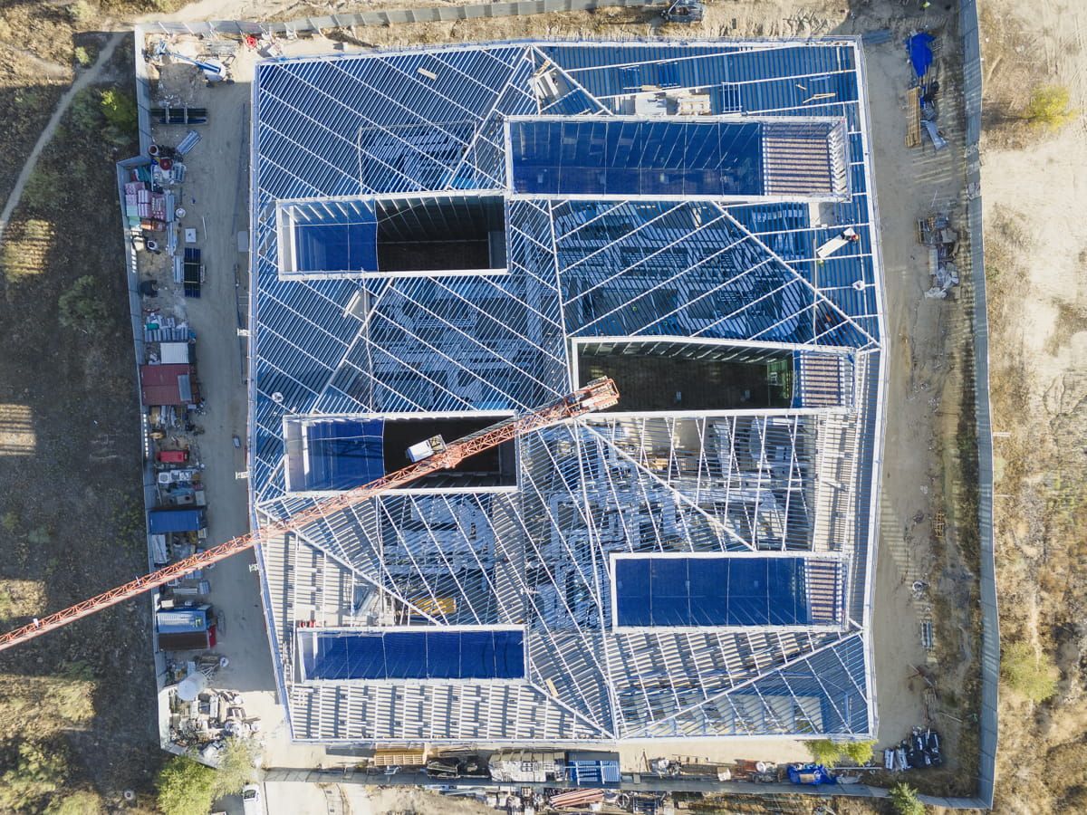 Aerial view of UNED Faculty of Science with Brise Soleils featuring Crystallline Silicon Photovoltaic Technology glass by Onyx Solar