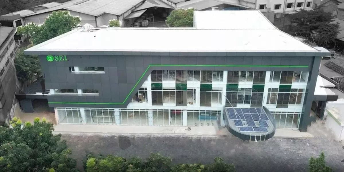 Overview of Surya Energy Indotama Office curtain wall incorporating Amorphous Silicon Photovoltaic Technology Glass by Onyx Solar