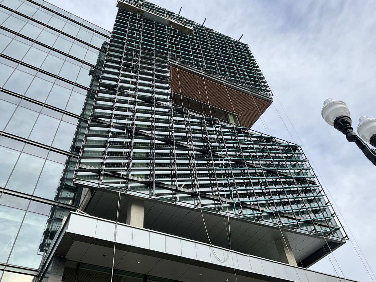 Façade of George Mason University building with Brise Soleils featuring Amorphous Silicon Photovoltaic Technology glass by Onyx Solar